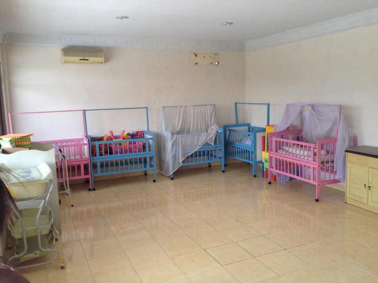 Many training centers have set-ups similar to this -- rooms that contain several beds, toilets, living room sets or child cribs, to train women to perform household chores in homes which may use different appliances or have different configurations. 